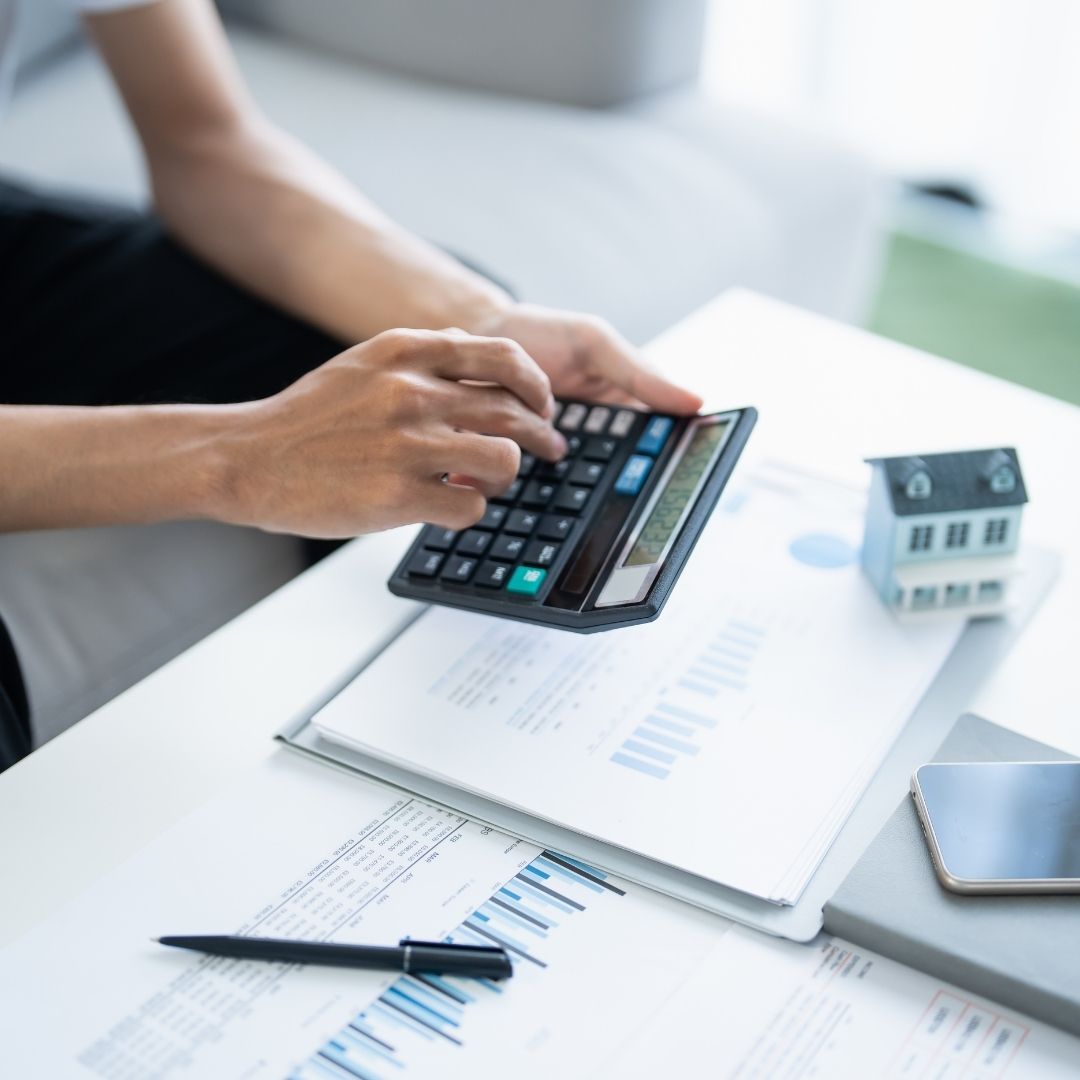 person calculating bills